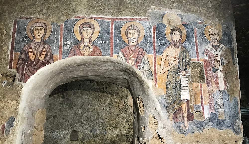 Lentini, finishes restoration of medieval saints in the rock church of the Crucifix