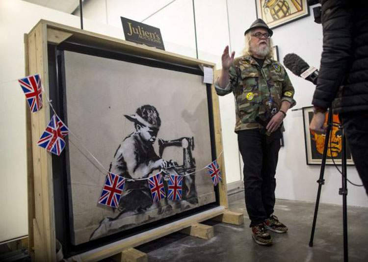 Ron English buys a Banksy and plans to completely whitewash it in protest