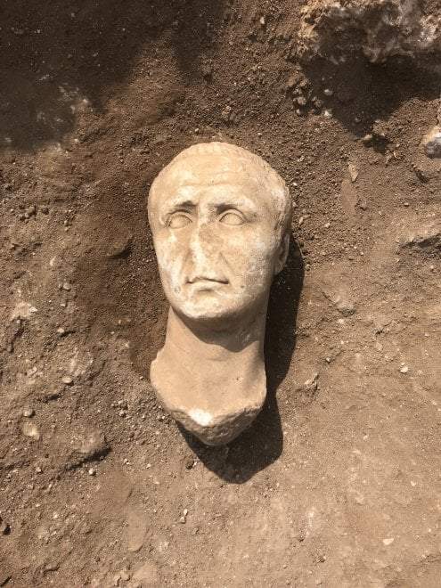 Three Roman marble heads found at Aquinum. One may depict Julius Caesar