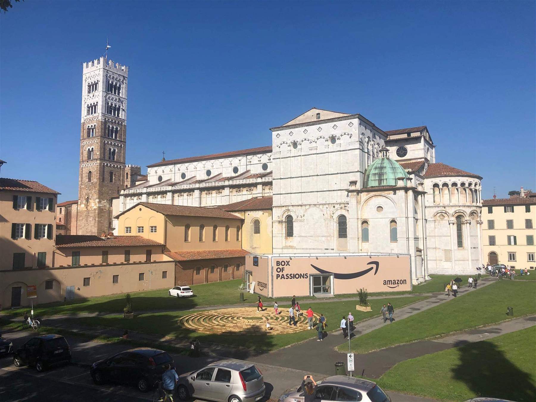 Lucca, Cathedral apsidal area turned into emoticon with invasive Amazon box