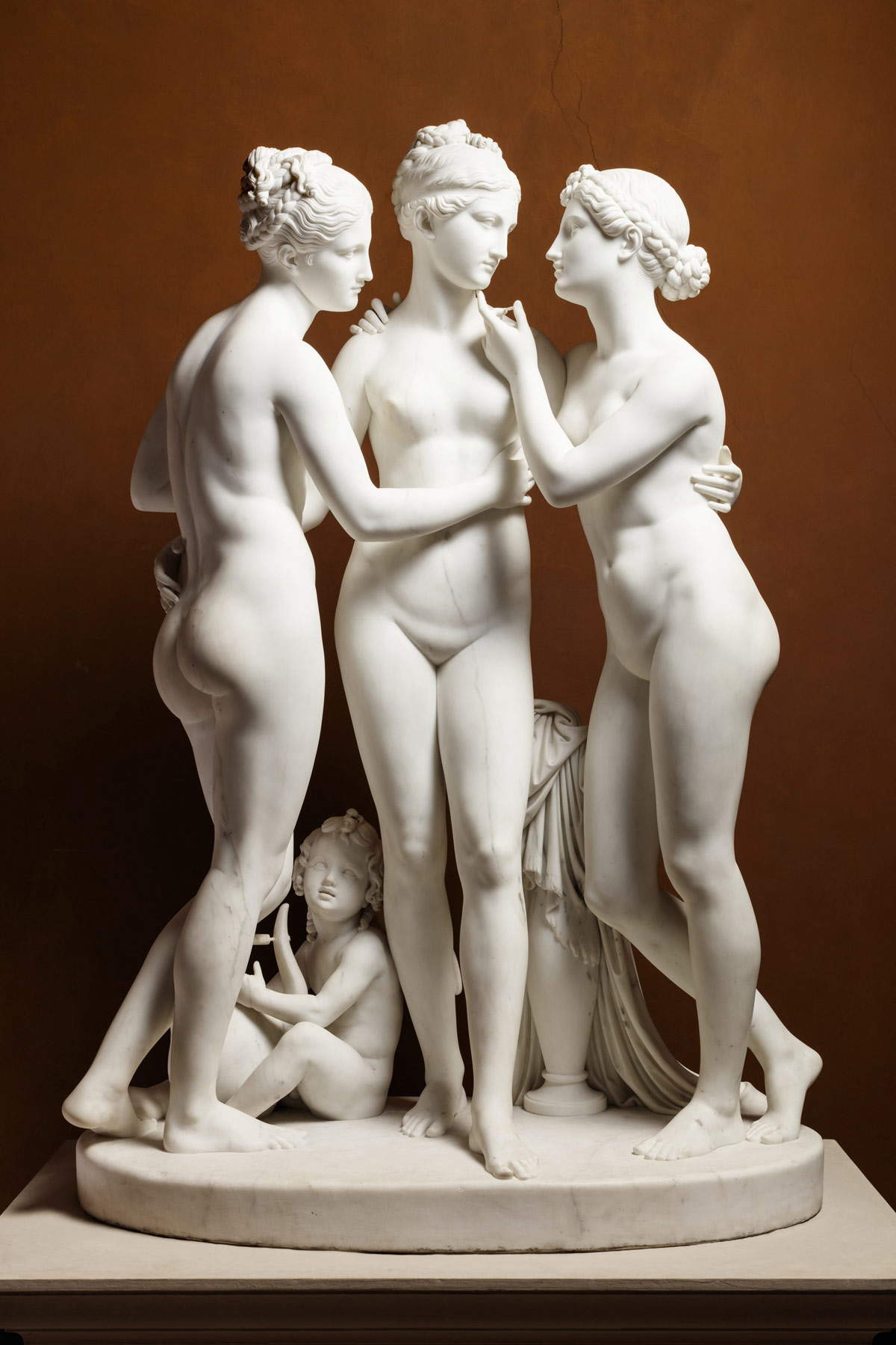 Bertel Thorvaldsen, The Graces with Cupid (1817-1819; marble, 172.7 x 119.5 x 65.3 cm; Copenhagen, Thorvaldsens Museum)