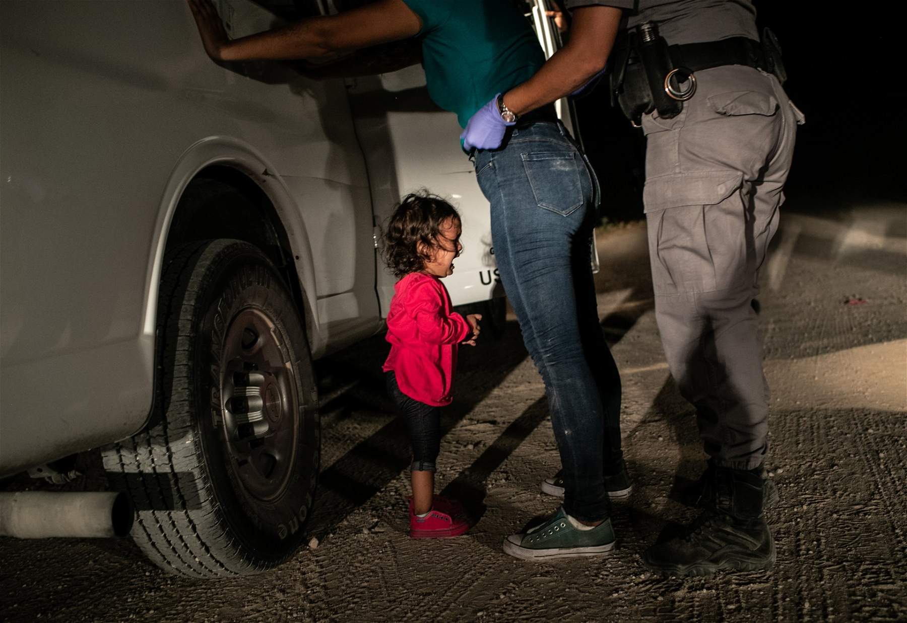 World Press, photo of the year is little girl crying at US/Mexico border, by John Moore. Italy shines