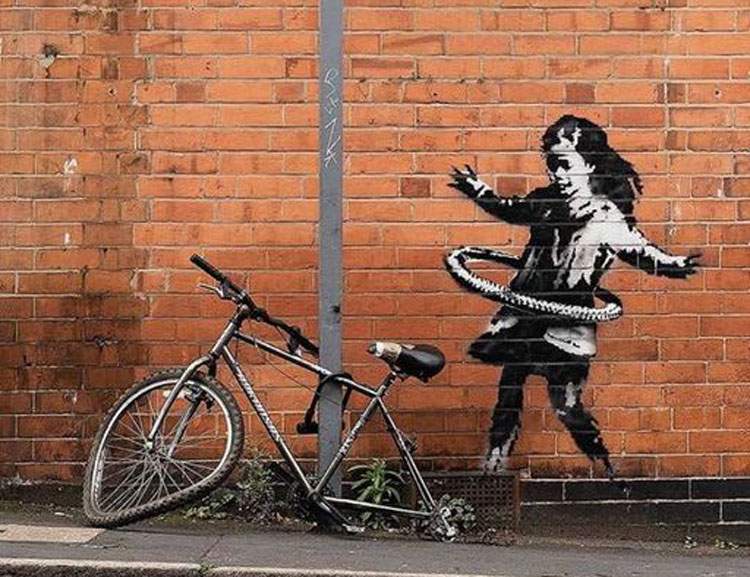 Banksy's is the little girl with hula hoop that appeared in Nottingham