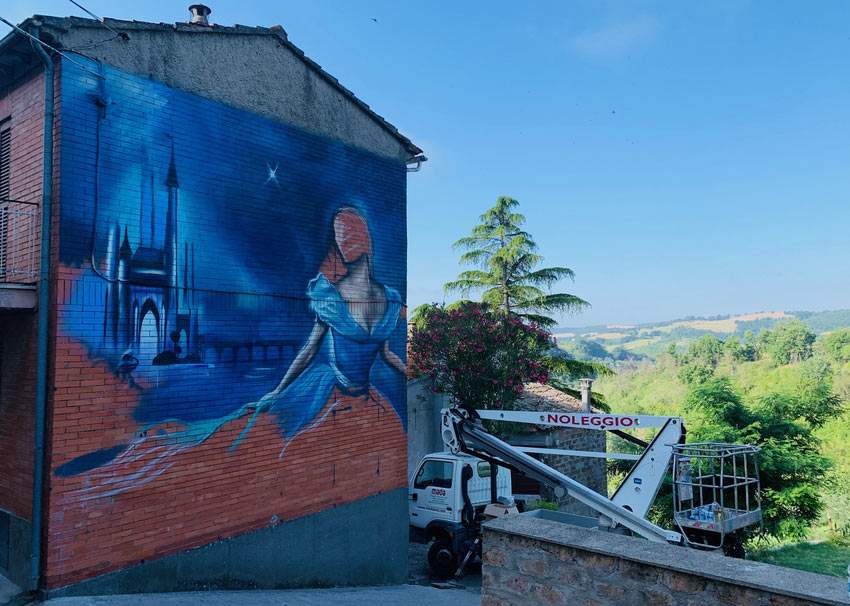 There is a fairy tale town in Tuscia all decorated with street art works