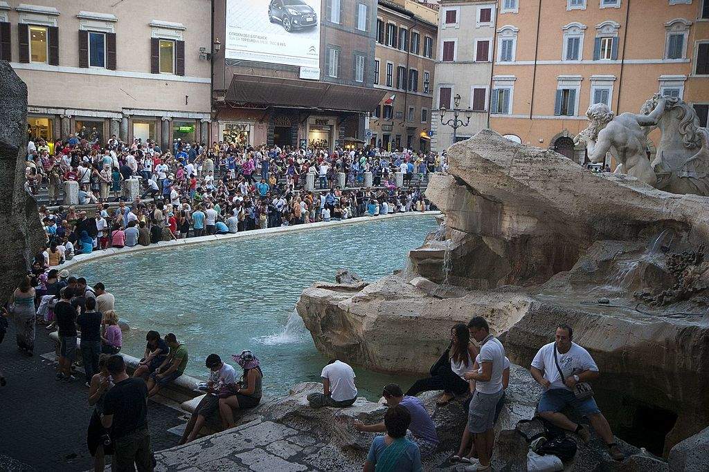 Trevi Fountain, a barrier against tourists sitting on the edge may be coming soon