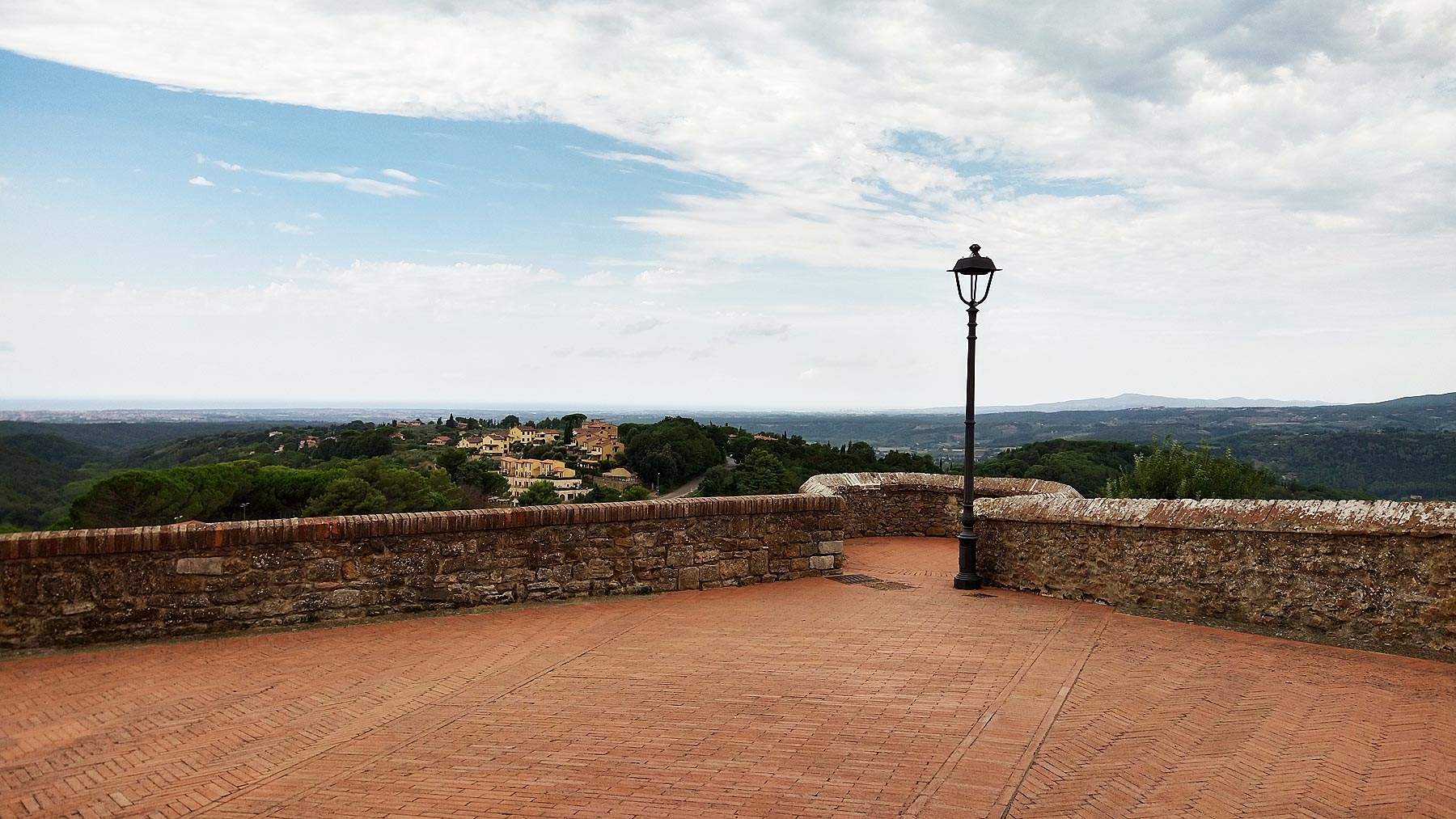 The village of Montescudaio, an ancient terrace overlooking the Cecina Valley and the sea
