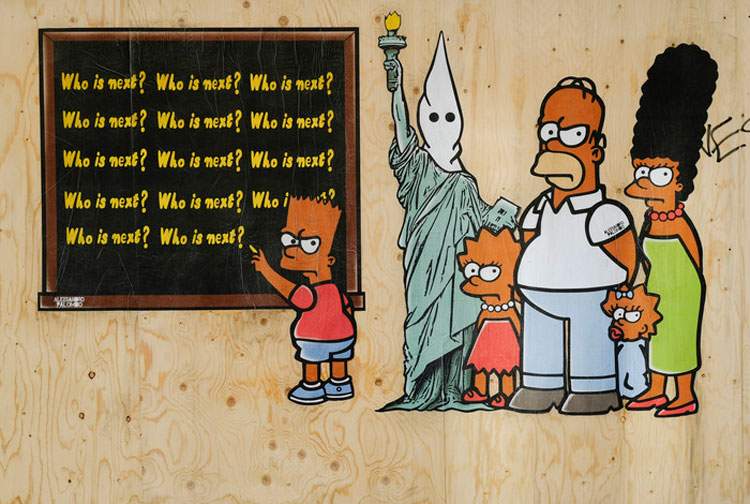 Street art: in Milan, the Simpsons in an African-American version in homage to George Floyd