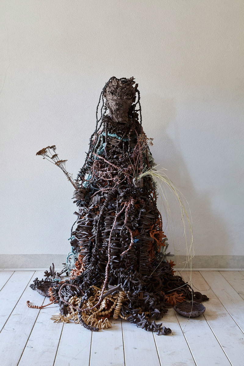 Chiara Camoni, Sister #01 (2020; polychrome terracotta, iron, wood, dried flowers, 125 x 70 x 60 cm)