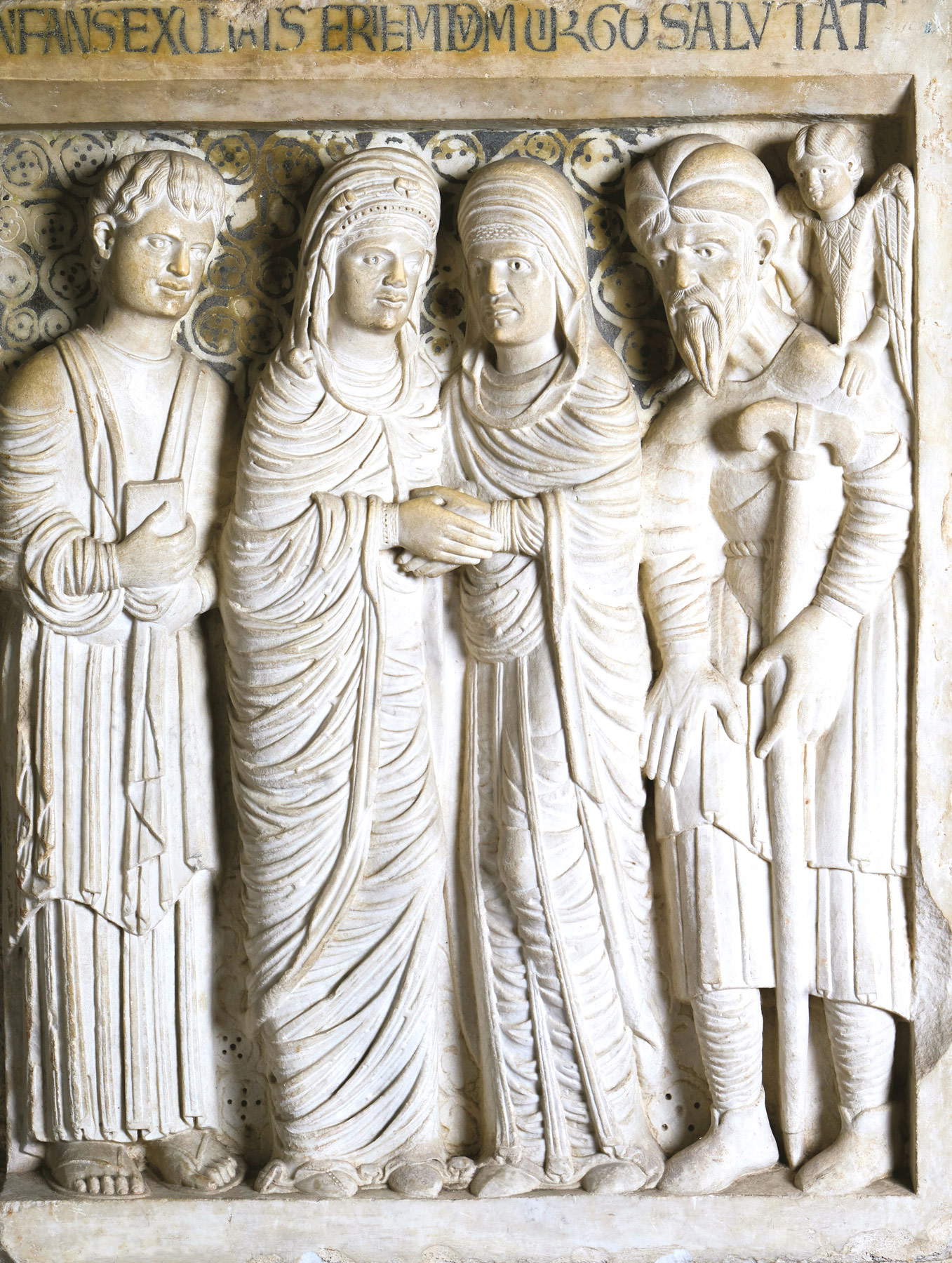 Guglielmo, Heimsuchung und Verkündigung an Zacharias (7. Jahrzehnt des 12. Jahrhunderts; Marmor und schwarzer Kitt; Pistoia, Kathedrale von San Zeno, Krypta) Guglielmo, Heimsuchung und Verkündigung an Zacharias (7. Jahrzehnt des 12. Jahrhunderts; Marmor und schwarzer Kitt; Pistoia, Kathedrale von San Zeno, Krypta)