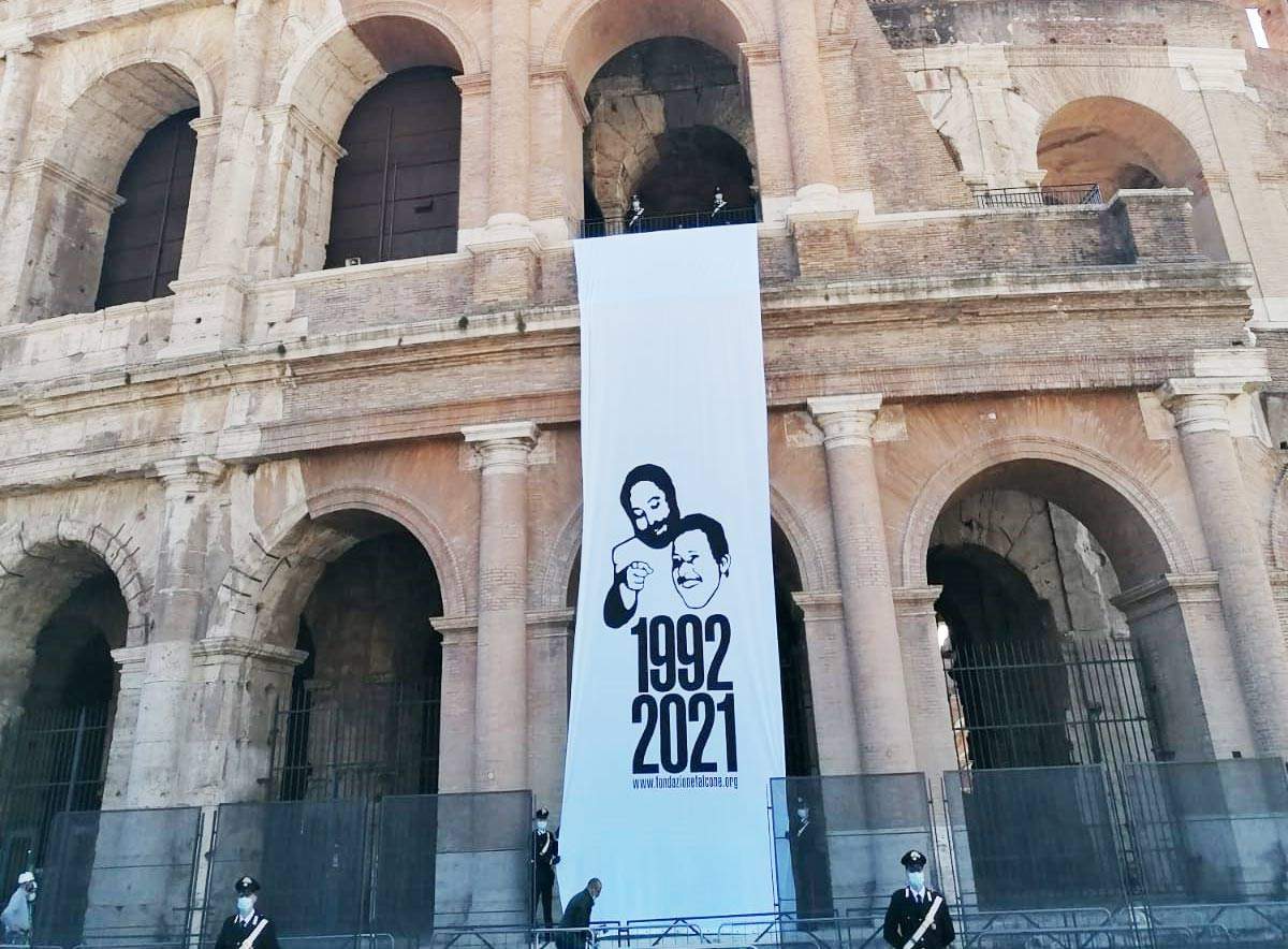 A 50-foot-long sheet was hung at the Colosseum against the Mafia 