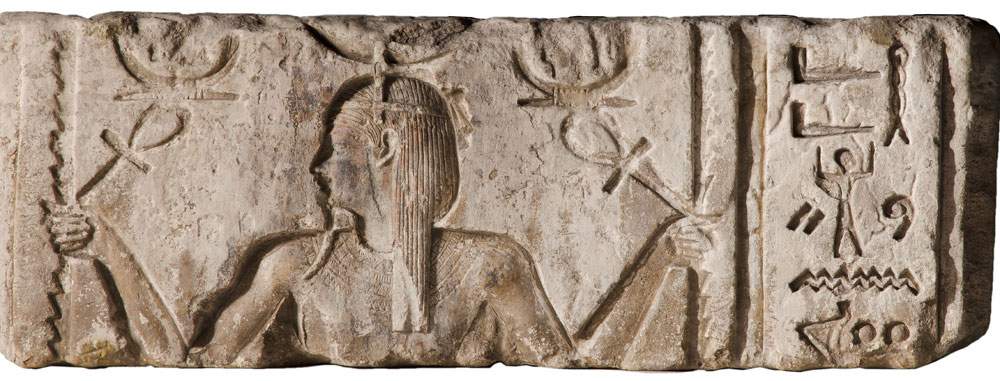 Open restoration for ancient Egyptian temple relief with god Heh at Bologna Archaeological Museum 