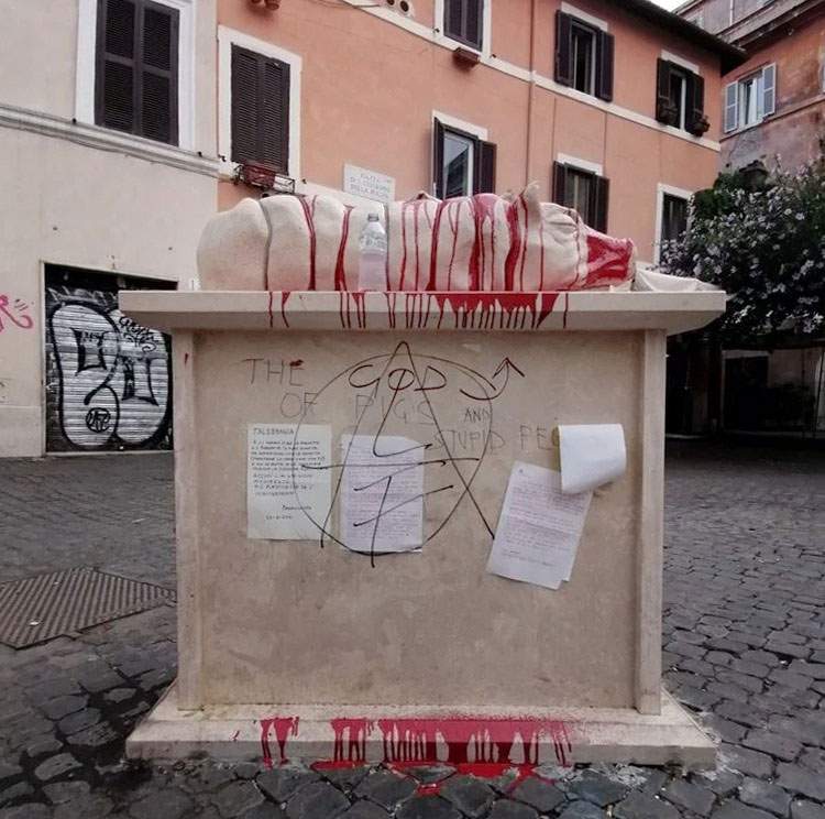 Rome, Trastevere's porchetta vandalized. Covered with red paint 