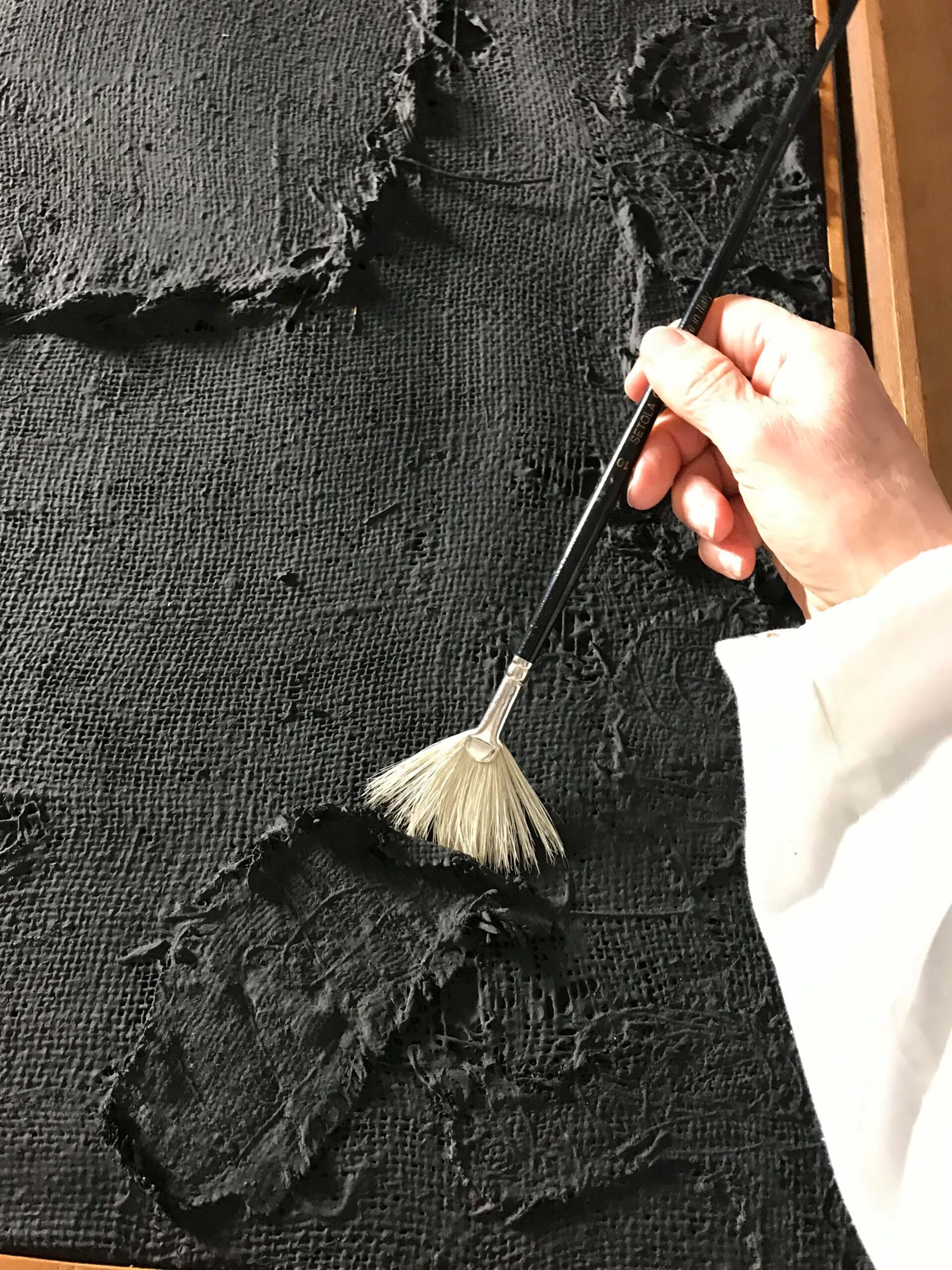 Restauración de Nerón con puntos de Alberto Burri