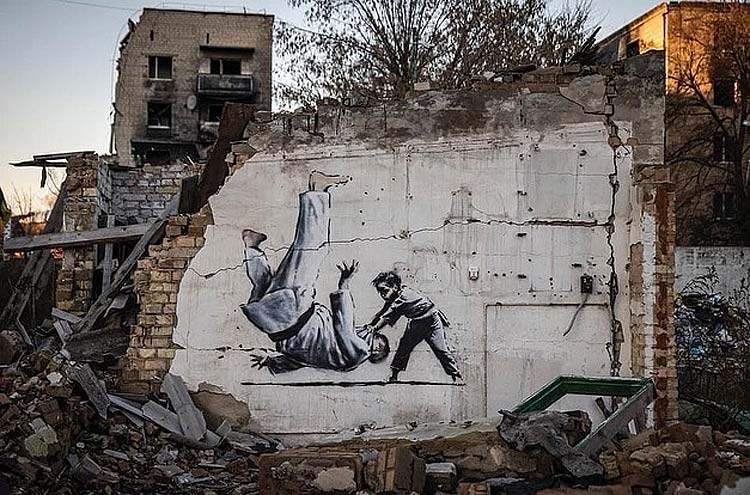 Ukraine, two murals attributed to Banksy photographed in Borodyanka