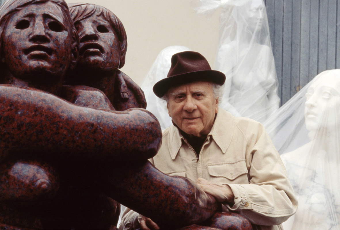 Francesco Messina in the workshop during the making of Adam and Eve in red granite. Francesco Messina in the workshop during the making of Adam and Eve in red granite.