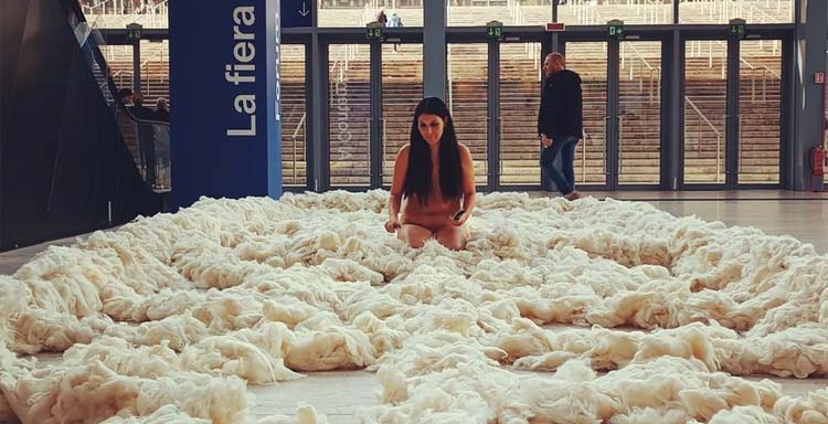 Who is the artist who was naked combing wool on the floor at Rome Art in the Cloud yesterday?