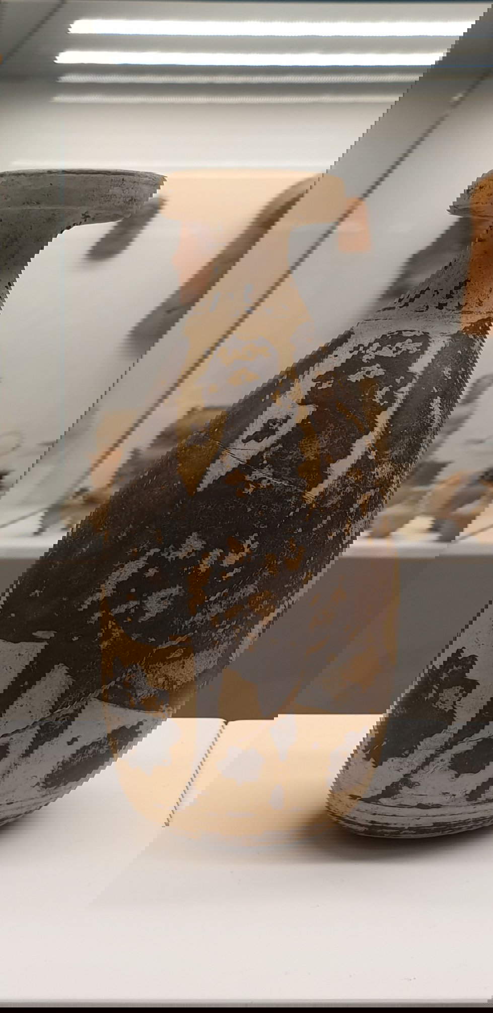 Arte magnogreca, Alabastron con sirena (VI secolo a.C.; alabastro; Reggio Calabria, Museo Archeologico Nazionale)