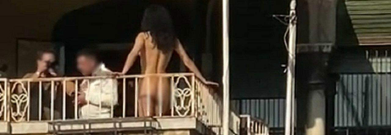 The naked woman on the balcony in Venice The naked woman on the balcony in Venice
