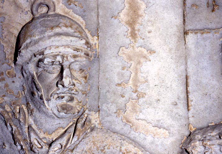 Rome, Trajan's Column, figure of ancient-Roman soldier still at 1995. The sculpture is still fairly well preserved because it is  Rome, Trajan's Column, figure of ancient-Roman soldier still at 1995. The sculpture is still fairly well preserved because it is