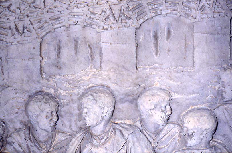 Rome, Rome, Trajan's Column, Emperor Trajan in front of the bridge over the Danube. Fragmentary layers of calcium oxalate are evident in the arches. Rome, Rome, Trajan's Column, Emperor Trajan in front of the bridge over the Danube. Fragmentary layers of calcium oxalate are evident in the arches.