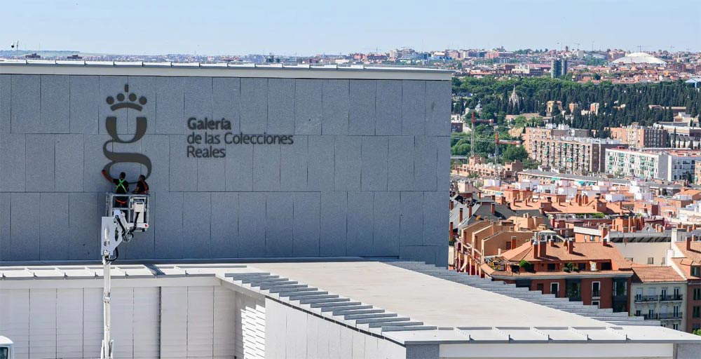 The installation of the logo on the facade The installation of the logo on the facade