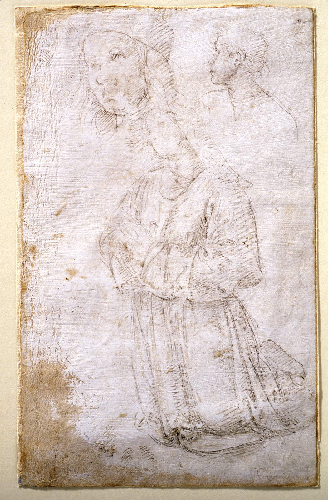 Pérugin, Sœur agenouillée aux mains jointes (pointe de métal rehaussée de blanc sur papier préparé blanc, 220 x 136 mm ; Williamstown, Clark Art Institute) Pérugin, Sœur agenouillée aux mains jointes (pointe de métal rehaussée de blanc sur papier préparé blanc, 220 x 136 mm ; Williamstown, Clark Art Institute)