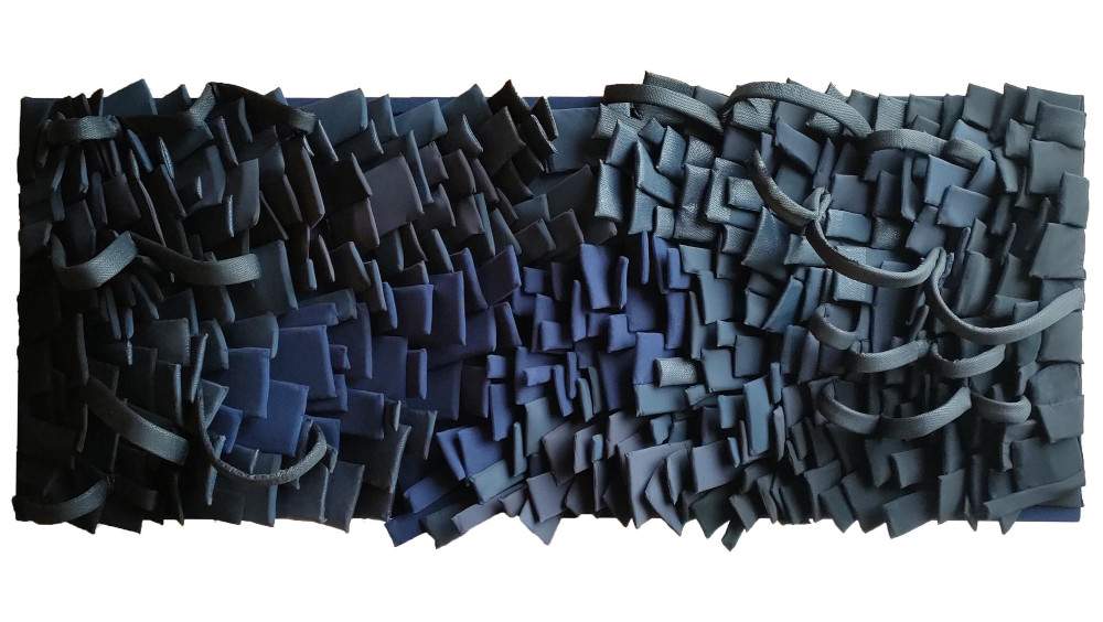 Emergence, the work made from discarded fabrics that is inspired by ... a fish 