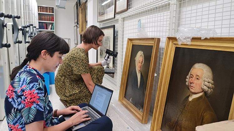 A British museum has two Ukrainian refugee professionals restore two paintings