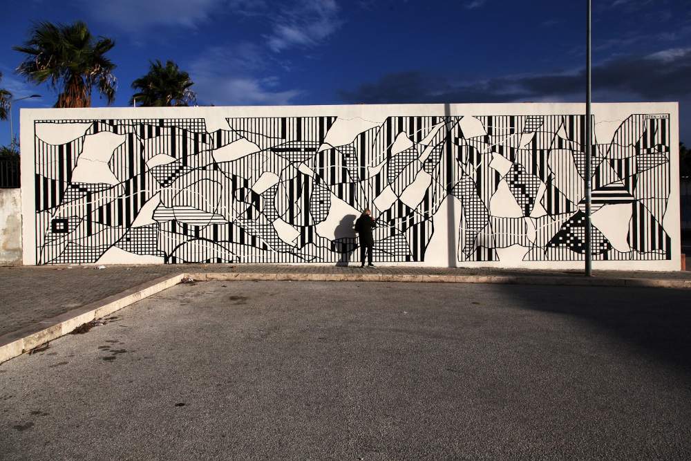Les œuvres de trois artistes de rue présentées dans le cadre d'une vaste exposition à Lucques font entrer l'art urbain dans la ville.
