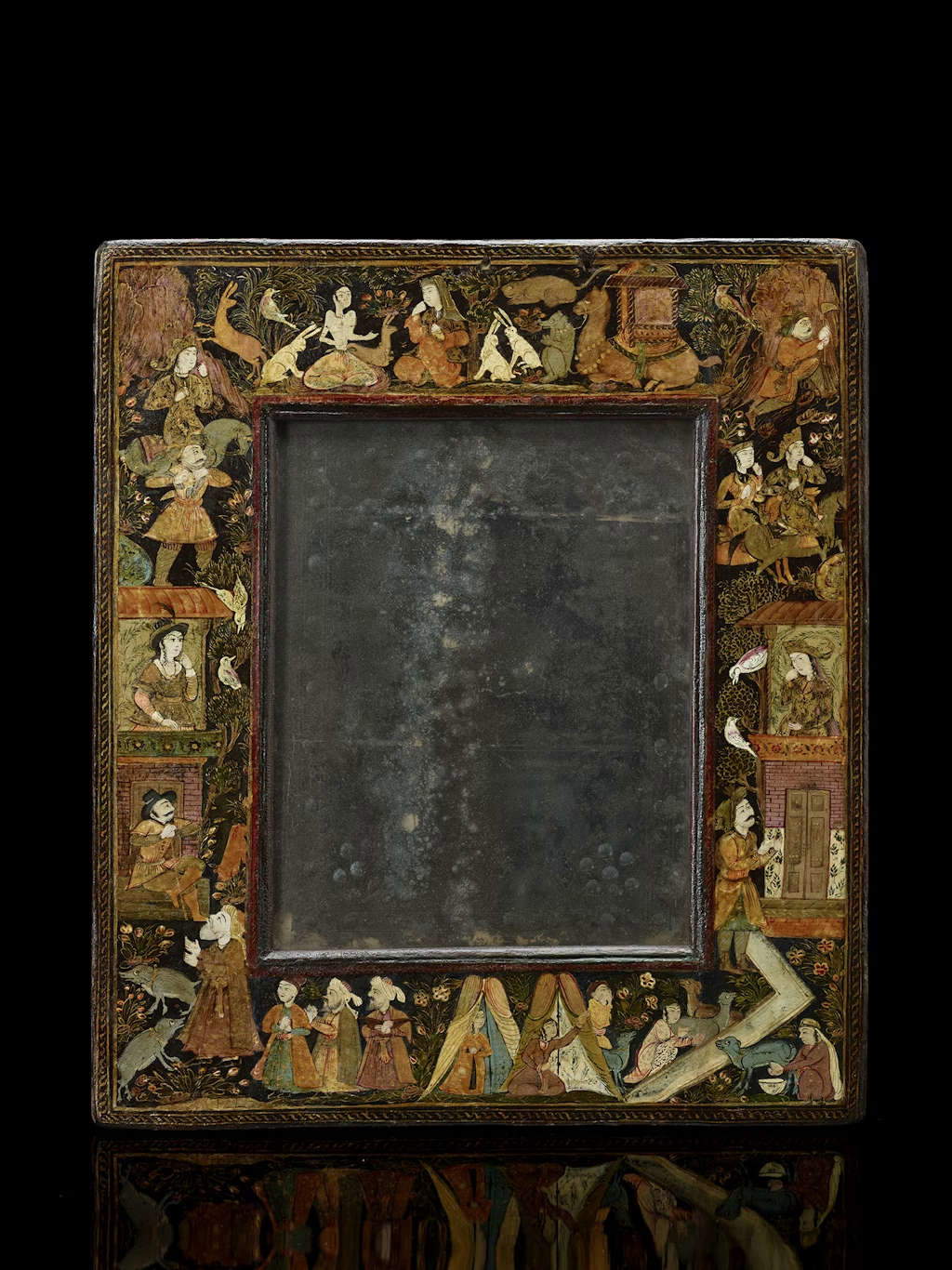 Safavid-framed mirror (first half of the 17th century, Amalgam mirror and polychrome shellac painting on wood, 39 x 34 x 2 cm).