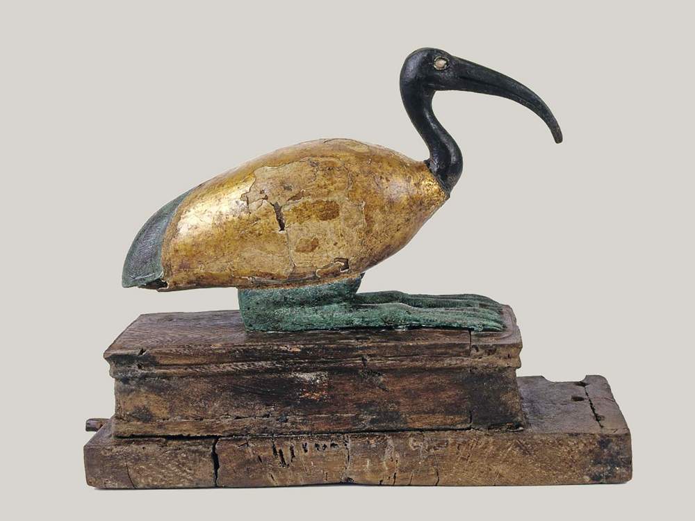 Egyptian artist, Statuette of the god Thot in the form of an ibis (Ptolemaic age - 332-30 BC; bronze and wood, 23.6 x 11 x 26.5 cm; Vatican City, Vatican Museums, Grassi Collection)