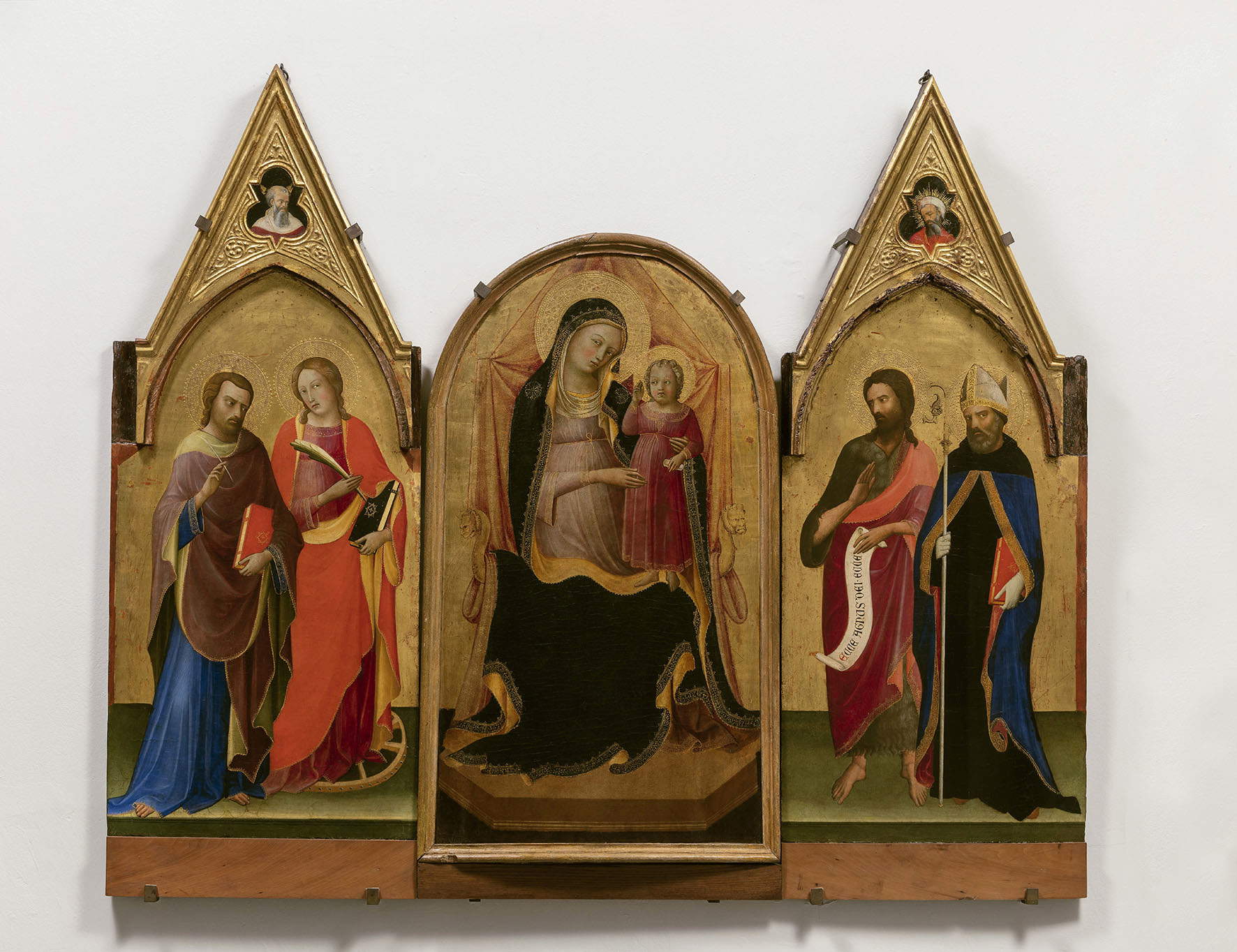 Piero di Giovanni known as Lorenzo Monaco and Francesco d'Antonio di Bartolomeo, Madonna and Child Enthroned between Saints Matthew, Catherine of Alexandria, John the Baptist and Augustine; Moses and Prophet (c. 1415; tempera and gold on panel, 101 × 58.5 cm the central panel, 132 × 54 cm each side; Empoli, Museo della Collegiata di Sant'Andrea, inv. 72) Piero di Giovanni known as Lorenzo Monaco and Francesco d'Antonio di Bartolomeo, Madonna and Child Enthroned between Saints Matthew, Catherine of Alexandria, John the Baptist and Augustine; Moses and Prophet (c. 1415; tempera and gold on panel, 101 × 58.5 cm the central panel, 132 × 54 cm each side; Empoli, Museo della Collegiata di Sant'Andrea, inv. 72)