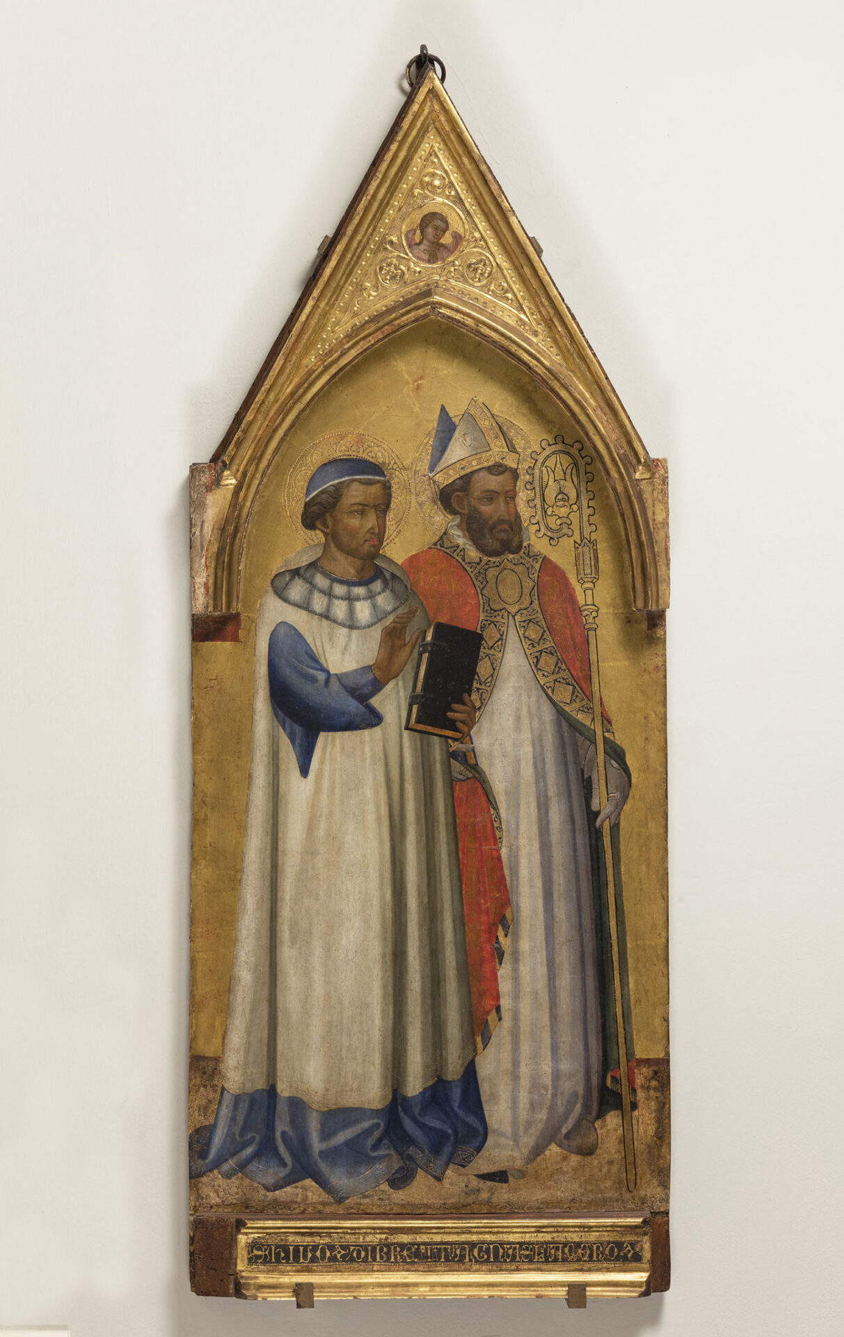 Scolaio di Giovanni, Saint Ivo Hélory of Brittany and Saint Lazarus (c. 1424; tempera and gold on panel, 140 × 55 cm; Empoli, Museo della Collegiata di Sant'Andrea, inv. 16) Scolaio di Giovanni, Saint Ivo Hélory of Brittany and Saint Lazarus (c. 1424; tempera and gold on panel, 140 × 55 cm; Empoli, Museo della Collegiata di Sant'Andrea, inv. 16)