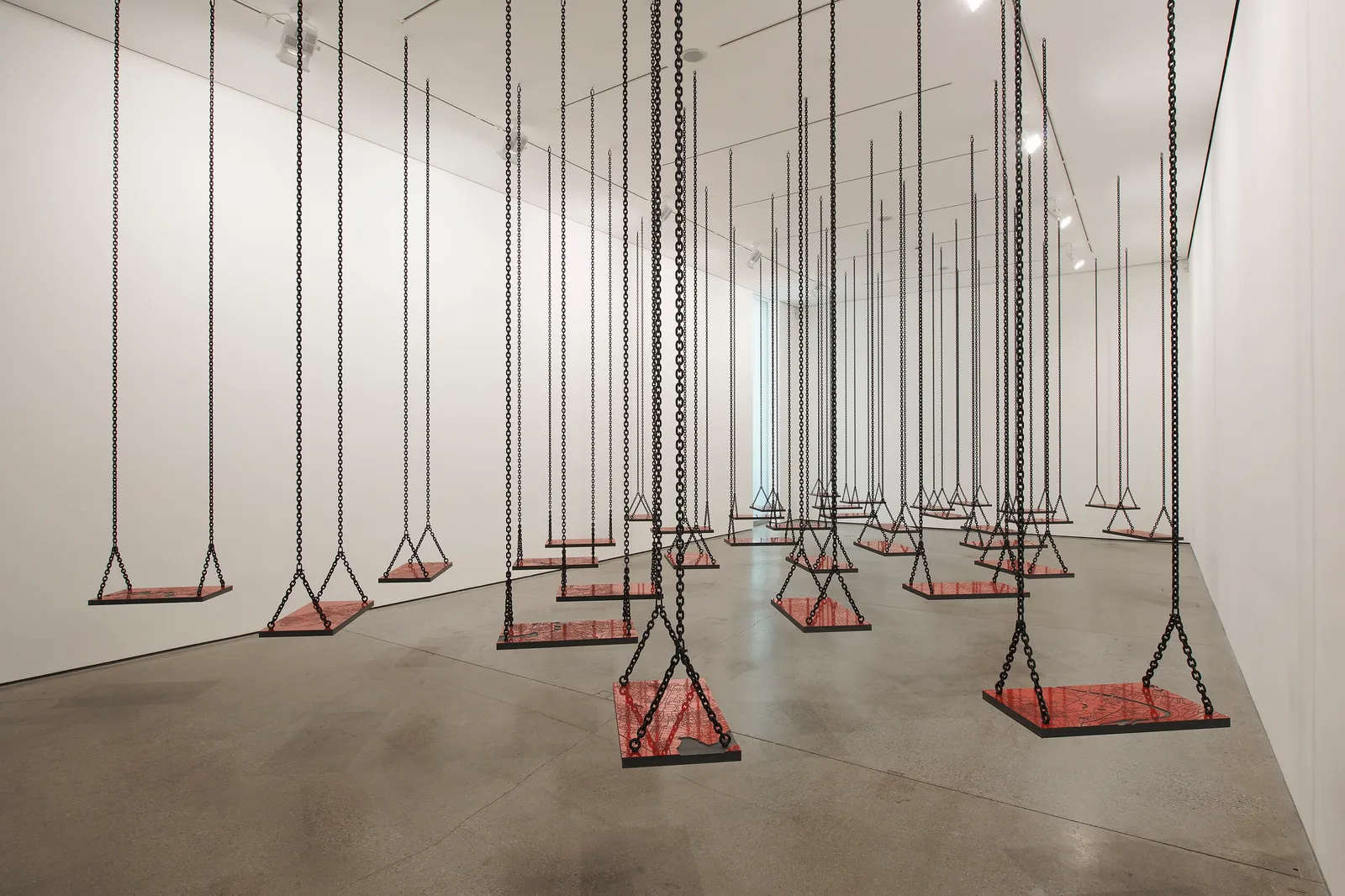 Mona Hatoum, Suspended (2011; laminate swings and metal chains, dimensions variable)