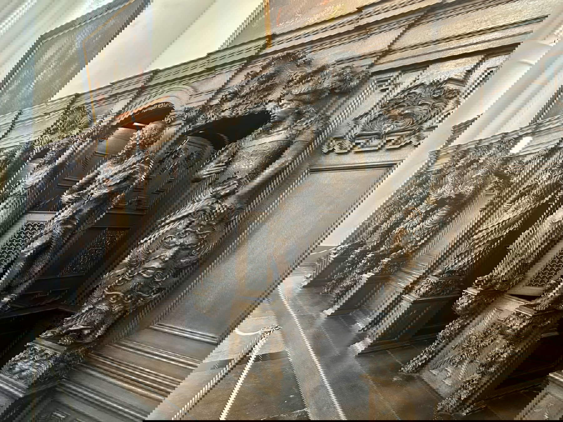 Oak-carved confessionals by Jacob Berger and Ludo Hagheman