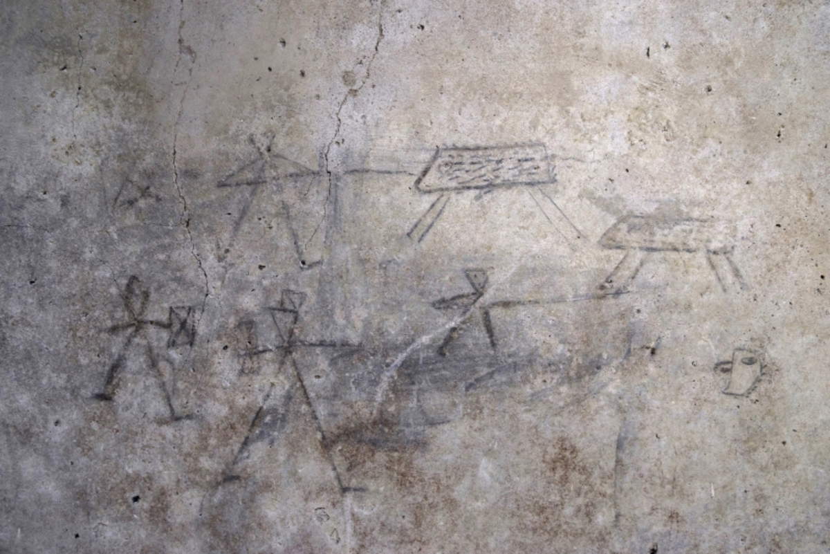 Dessins d'enfants dans l'Insula des Casti Amanti à Pompéi Dessins d'enfants dans l'Insula des Casti Amanti à Pompéi
