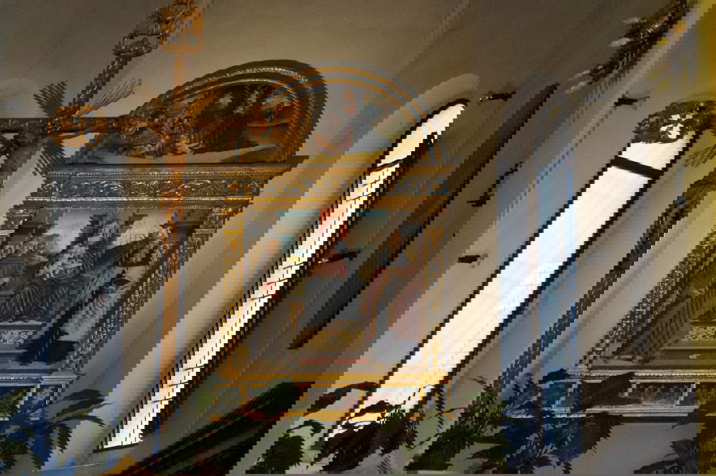 Marco Palmezzano, Virgen en trono amamantando al Niño entre los santos Antonio de Padua y Agustín (Castrocaro Terme, Iglesia de los Santos Nicolás y Francisco)