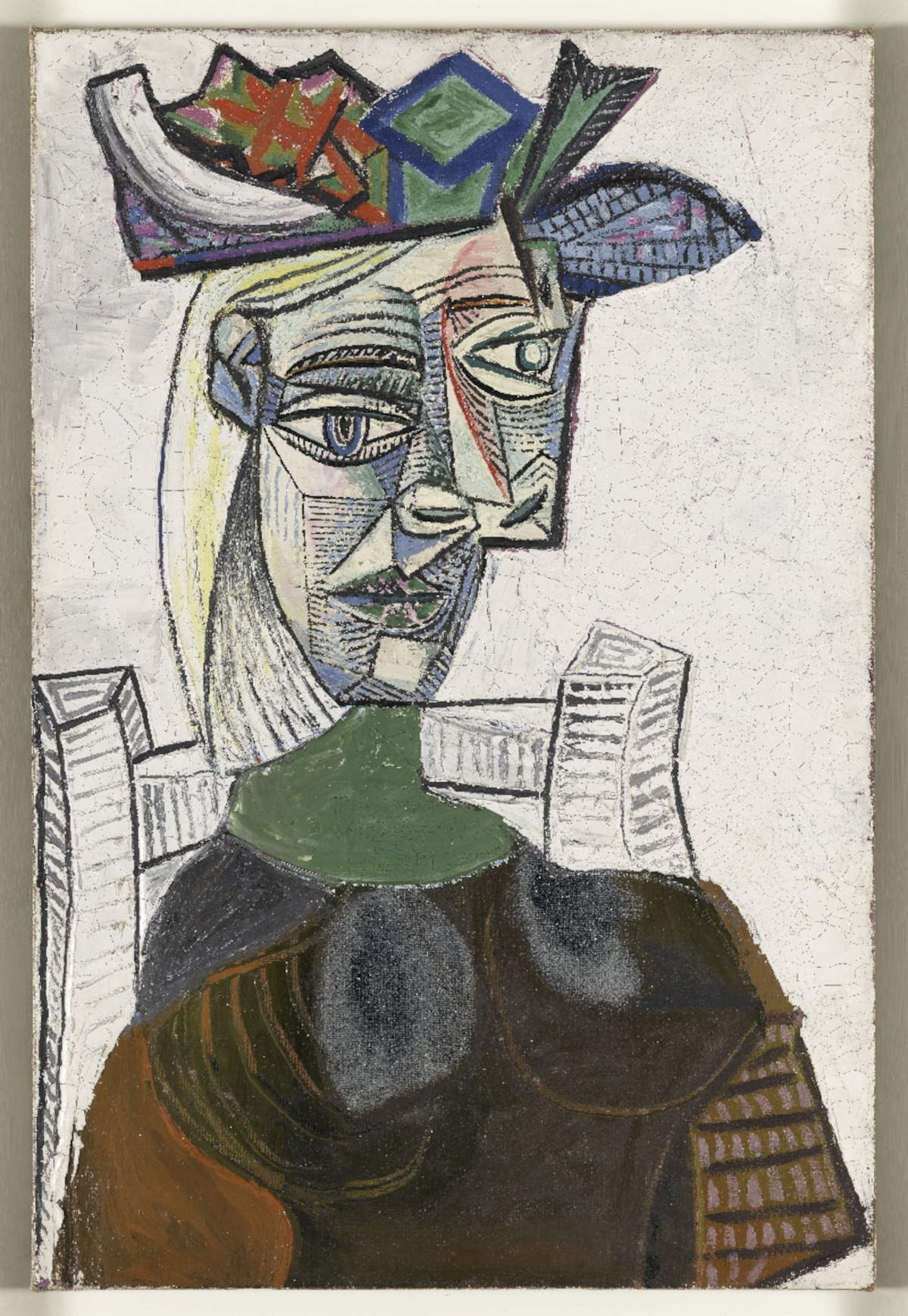 Pablo Picasso, Femme assise au chapeau (Paris, 27. Mai 1939; Öl auf Leinwand; Picasso, Musée national Picasso-Paris Dation Pablo Picasso, 1979. MP179) © Succession Picasso by SIAE 2024 Foto © RMN-Grand Palais (Musée national Picasso-Paris) / Adrien Didierjean
