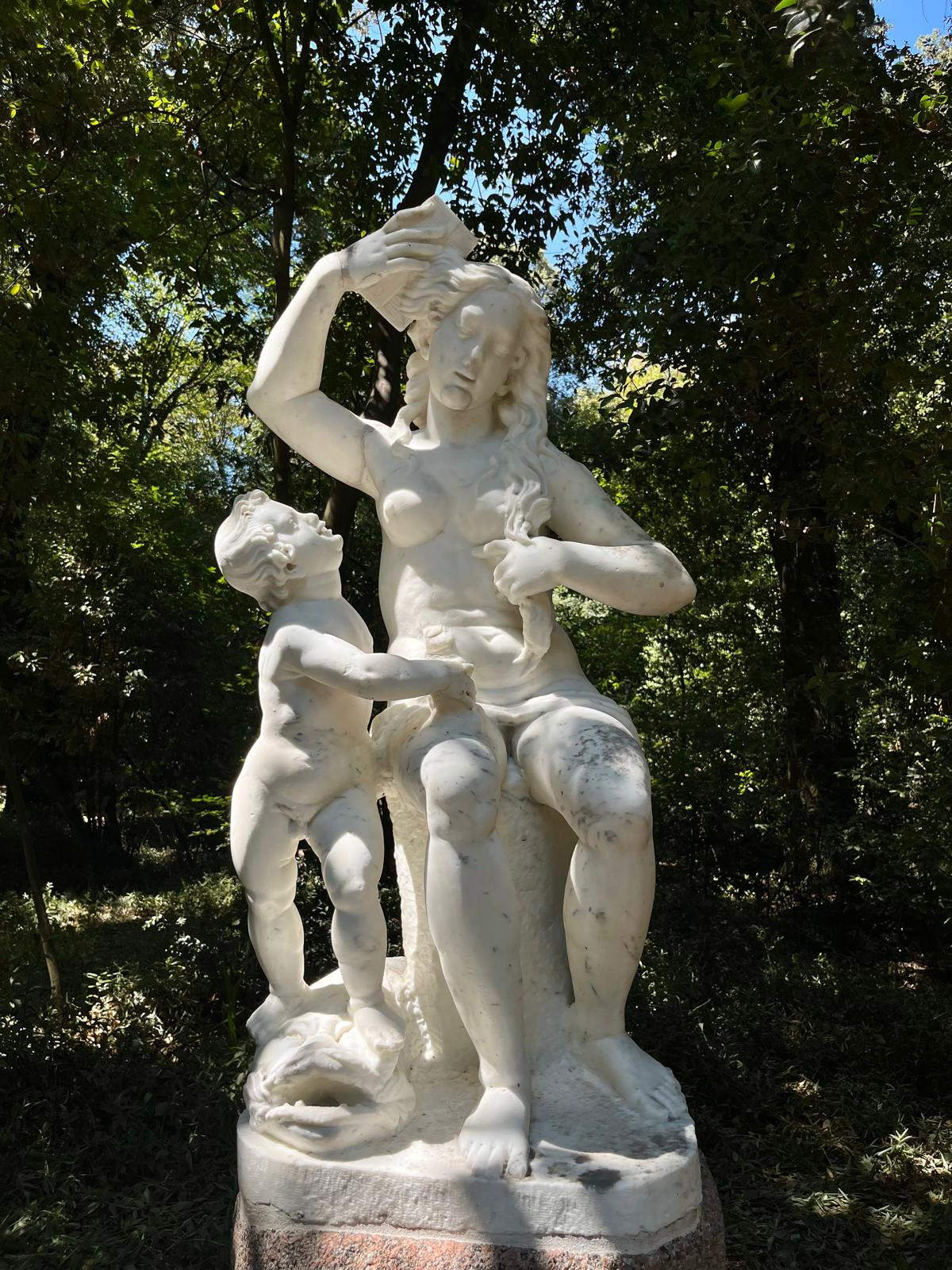 Venus combing her hair restored