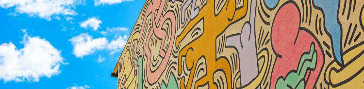 La extraordinaria historia de la realización del Tuttomondo de Keith Haring en Pisa