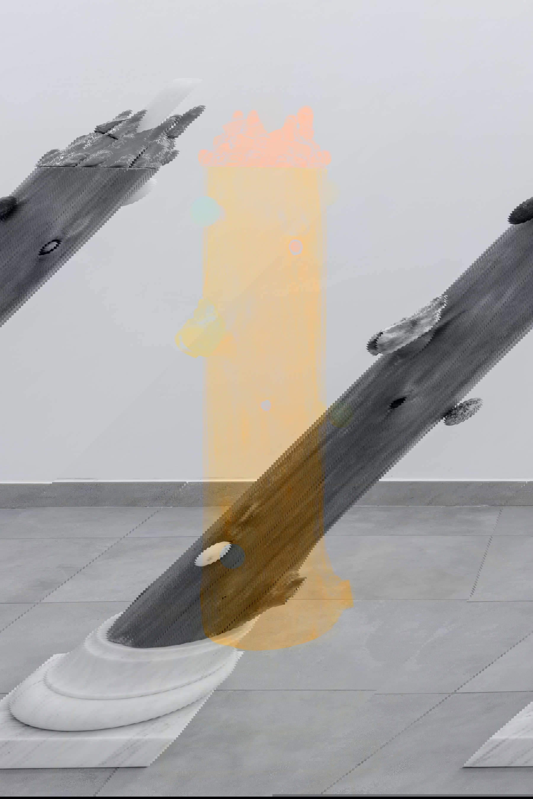 Michele Chiossi, Masino (2025; wood, statuary marble, polychrome marble, silver casting, brass casting, terracotta, candle, Vivienne Westwood handkerchief, 40x40x150 cm) Michele Chiossi, Masino (2025; wood, statuary marble, polychrome marble, silver casting, brass casting, terracotta, candle, Vivienne Westwood handkerchief, 40x40x150 cm)