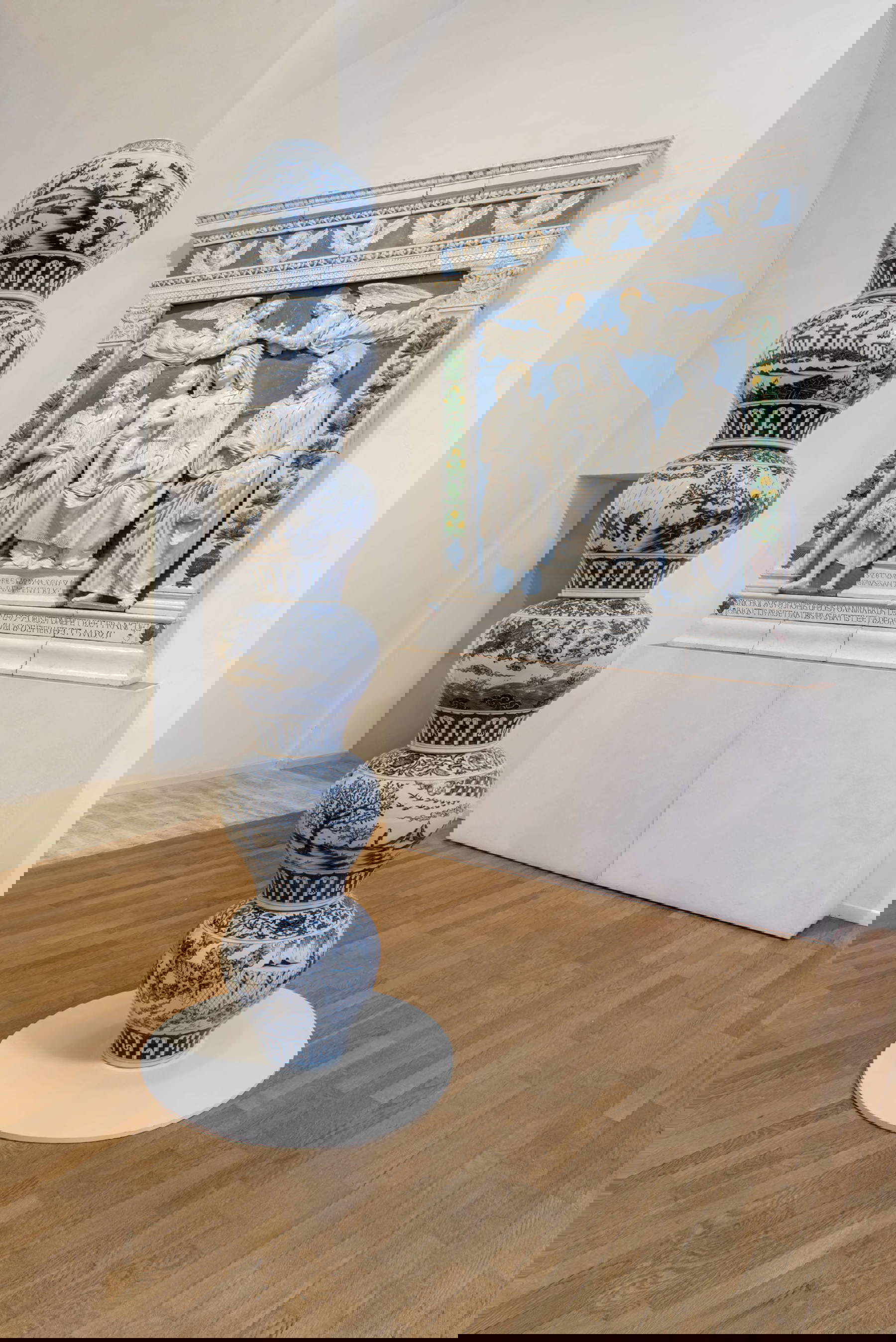 Ai Weiwei, Porcelain Pillar with Refugee Motif (2017), installation view at the Museum of Sacred Art at the Gold Complex in Montalcino. Photo: Ela Bialkowska / OKNO Studio