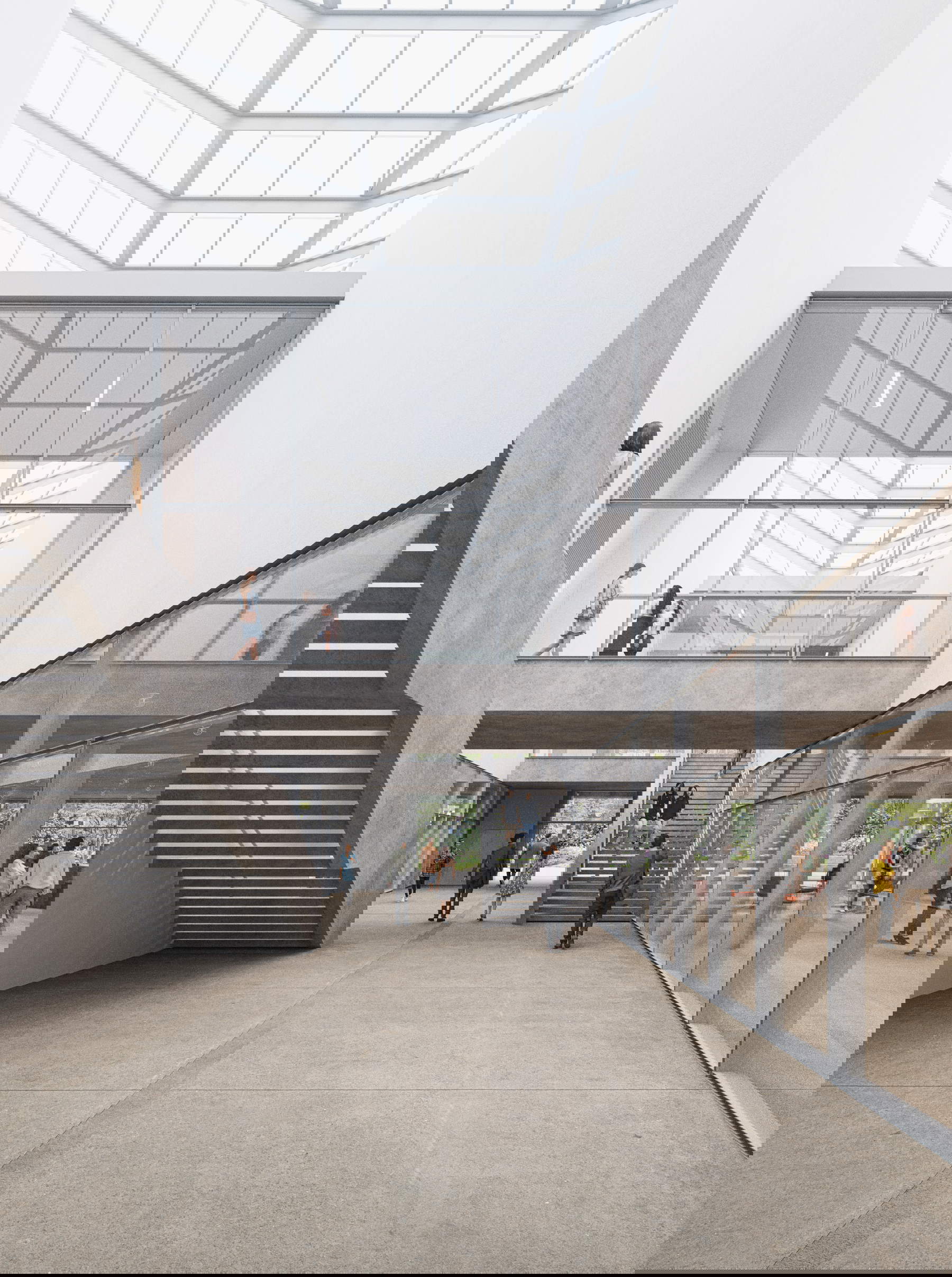 The large central staircase. Render &copy; Design - Robbrecht and Daem Architects and Olivier Salens Architects. Image by MakeMe