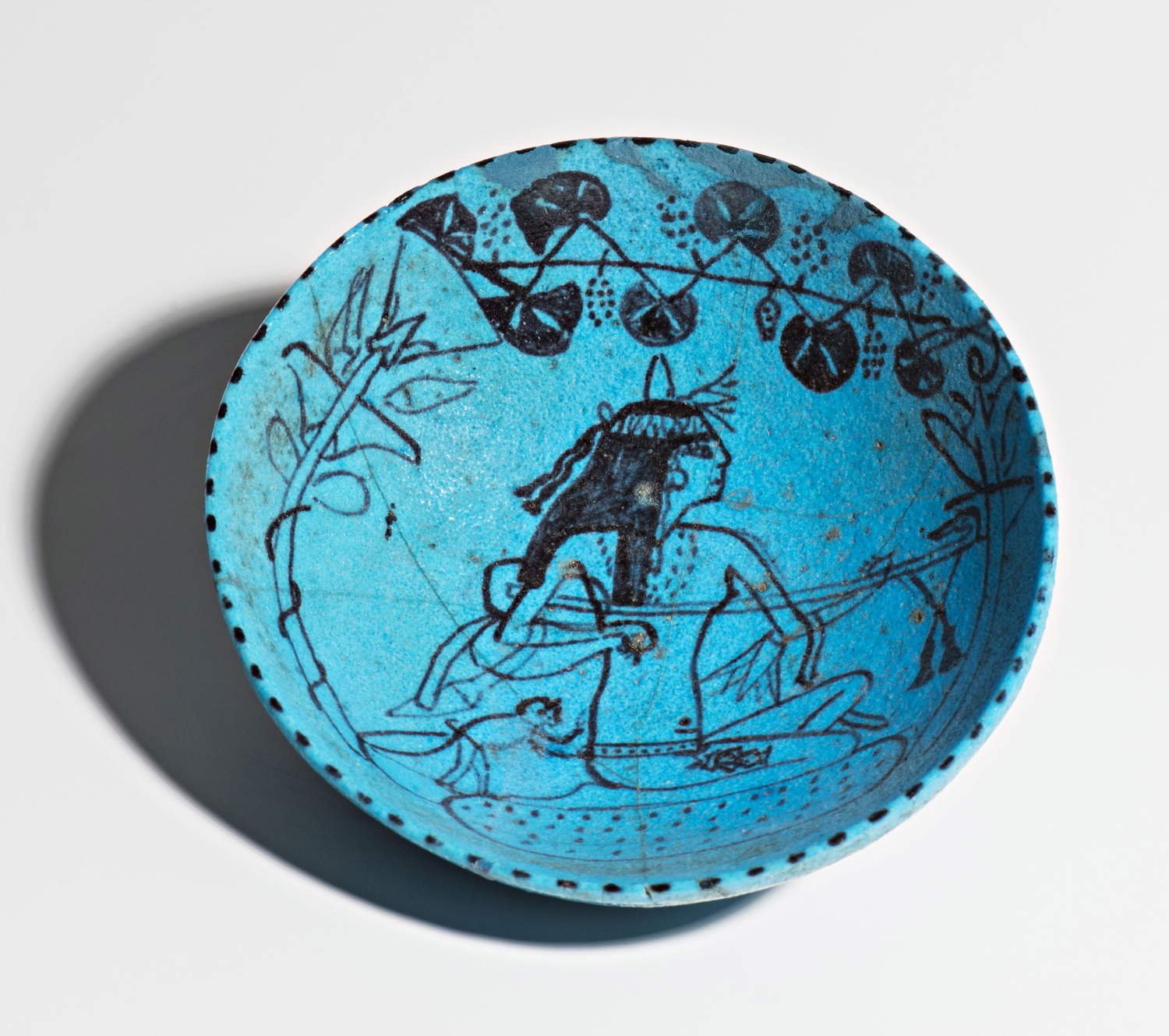 Bowl depicting a lute player (New Empire, c. 1400-1300 BC, faience, 4.5 x 14 cm; Leyde, Rijksmuseum van Oudheden). &copy;Dutch National Museum of Antiquities