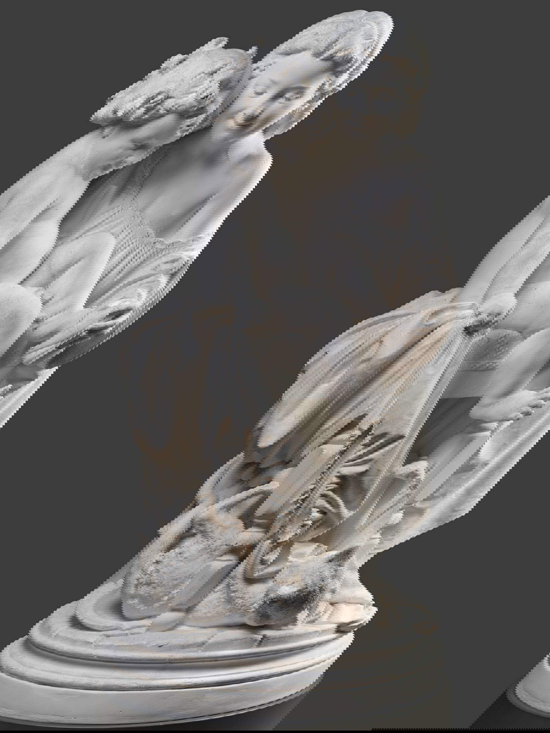 Giulio Monteverde, Early Games. Children playing with a cat (1874; Genoa, Musei di Nervi, GAM Galleria d'Arte Moderna)