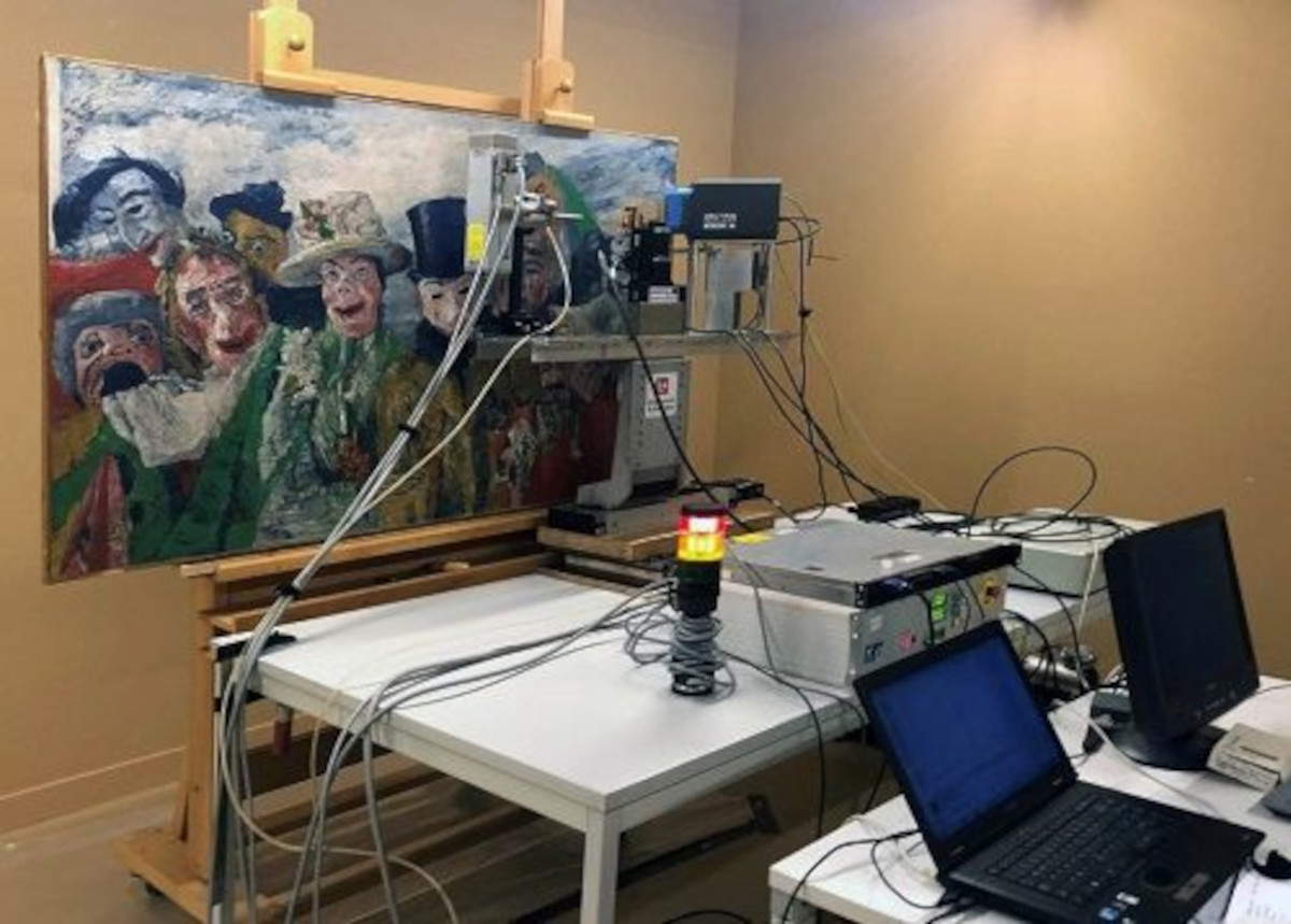 Annelies Rios Casier (University of Antwerp) while micro-sampling from a green background of James Ensor's L' Intrigue (Photo credit: Lies Vanbiervliet; photo taken at a KMSKA restoration studio)