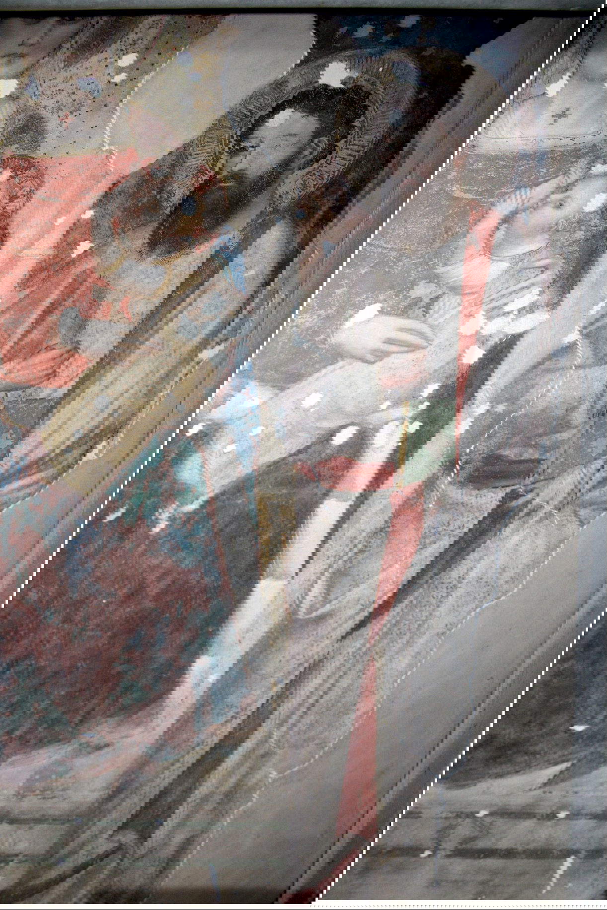 Das Fresko Madonna del Latte mit Kind zwischen den Heiligen Johannes dem Täufer und Bartholomäus während der Verputzphase