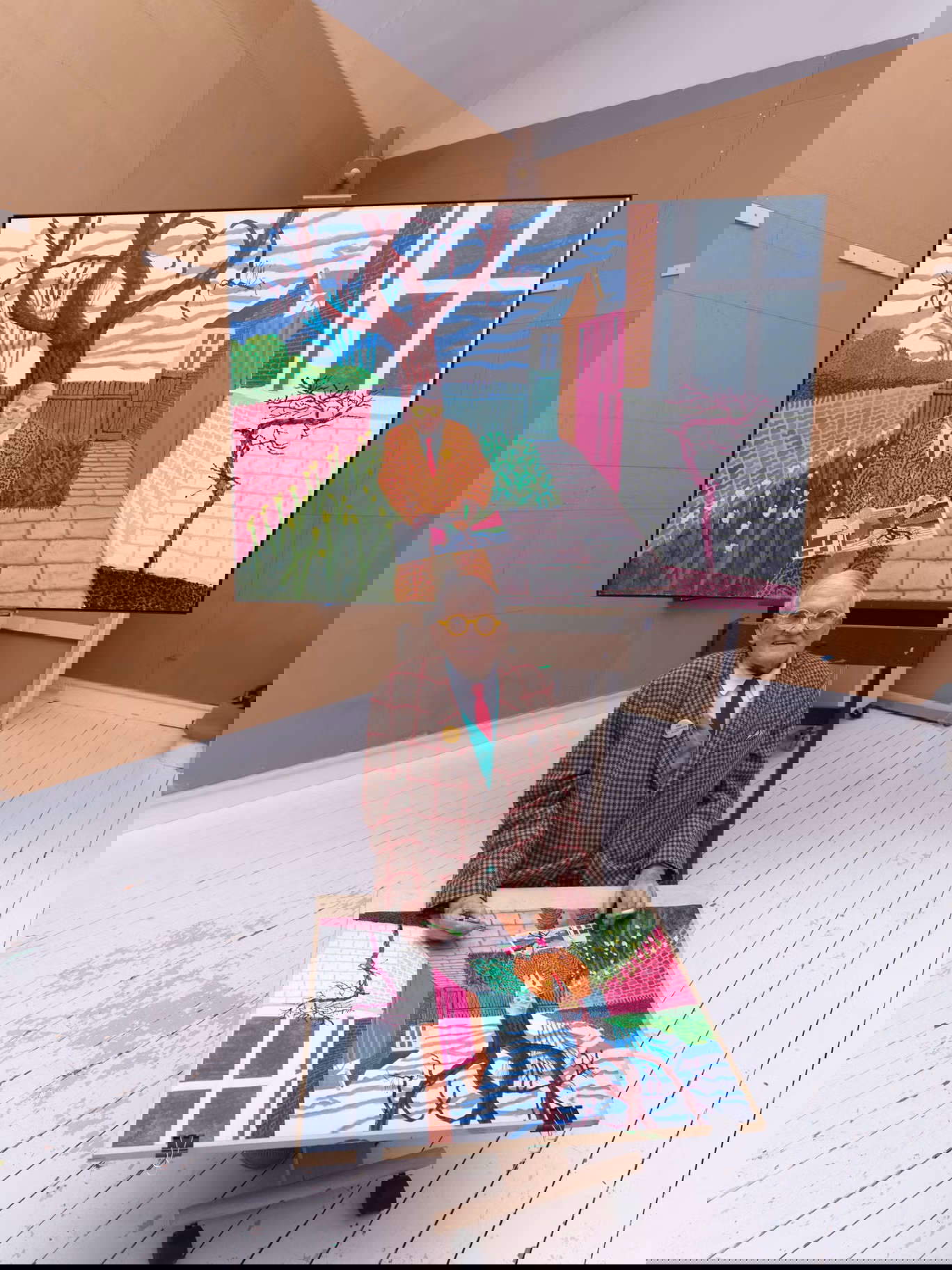 The photograph with Hockney holding a cigarette.