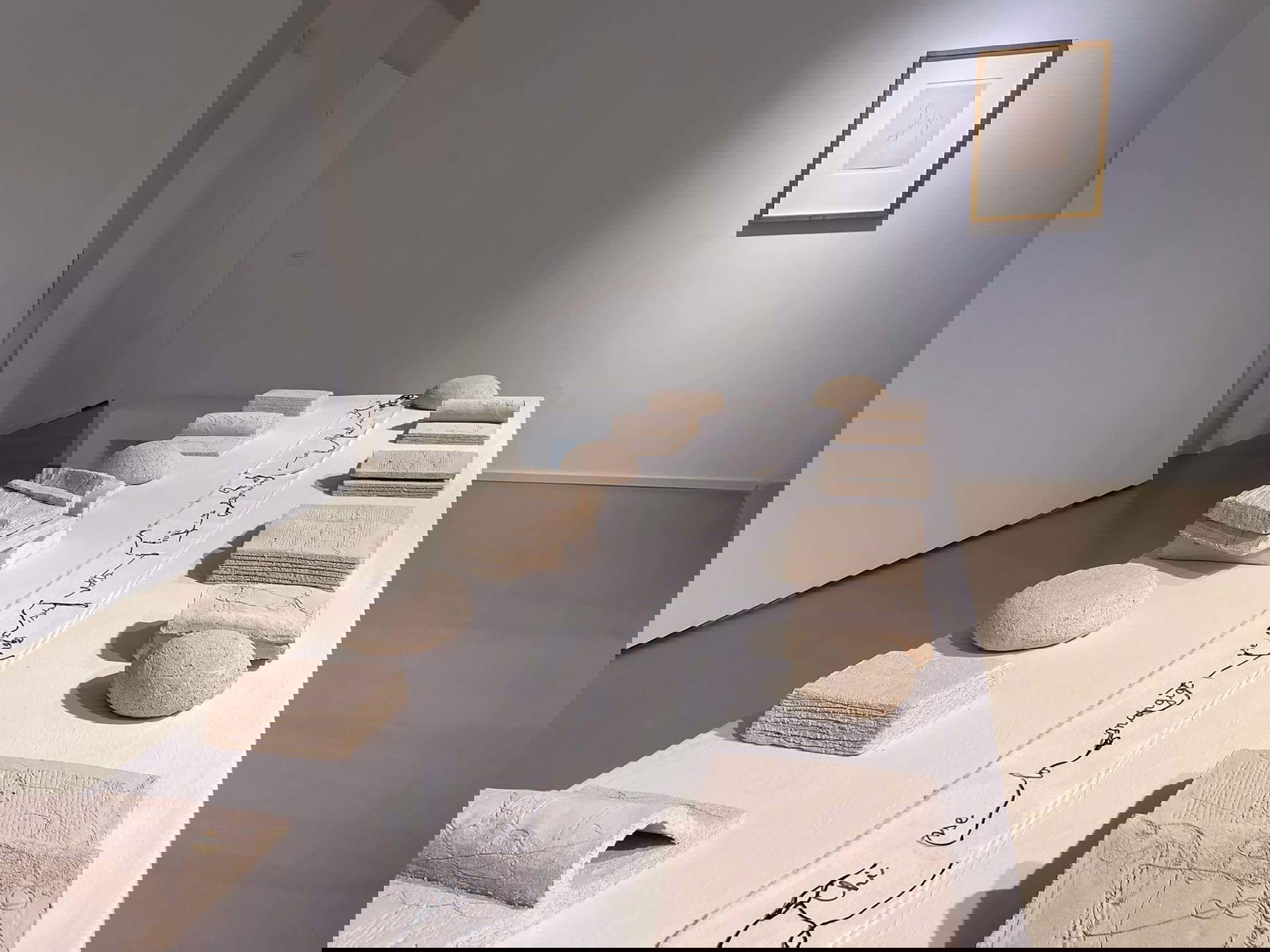 Maria Lai, Invitation to the Table (2004; exhibition view, refractory earthenware, dimensions variable; Art Station Foundation Collection). @Stazione dell'Arte