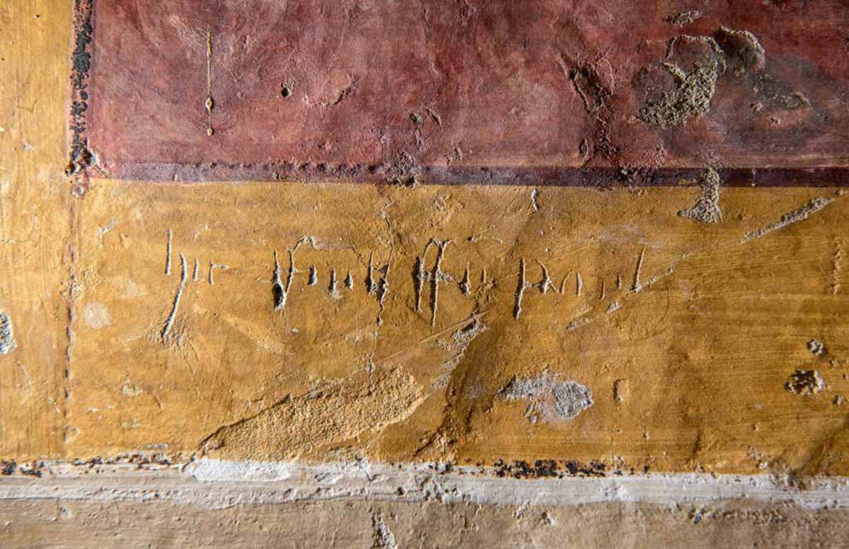 Montefalco, Iglesia de San Francisco, affresco con scritta latina